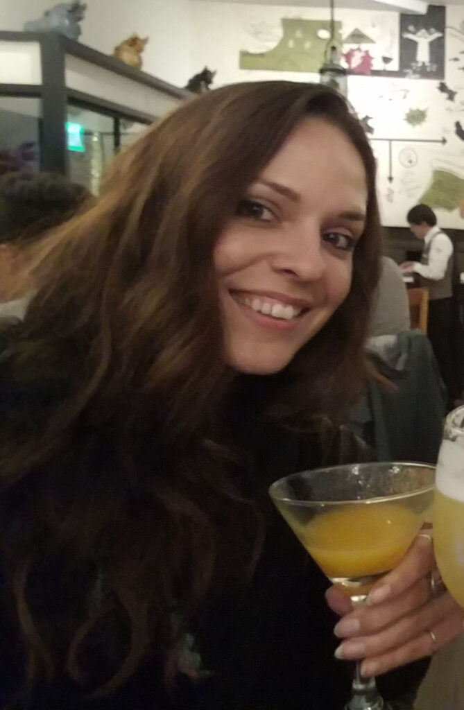 Linds posing with her Pisco Sour, the official Peruvian beverage, in a bar in Cusco, Peru