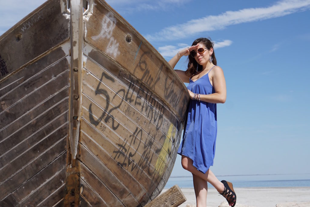 Abandoned boat and Linds at the Salton Sea shore in Bombay Beach, California