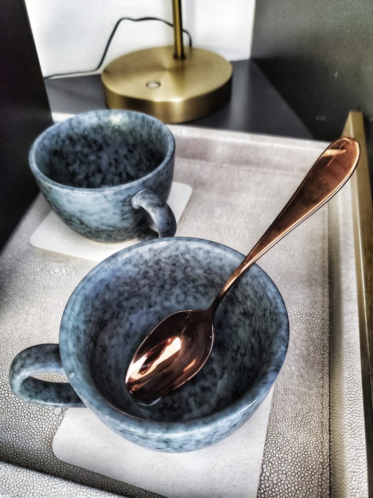 beautiful mugs and bronze spoons