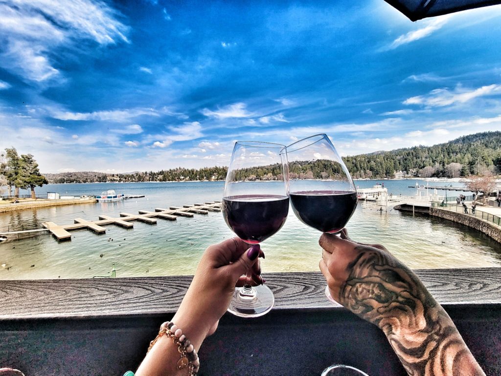 Cheers with red wine at Lake Arrowhead