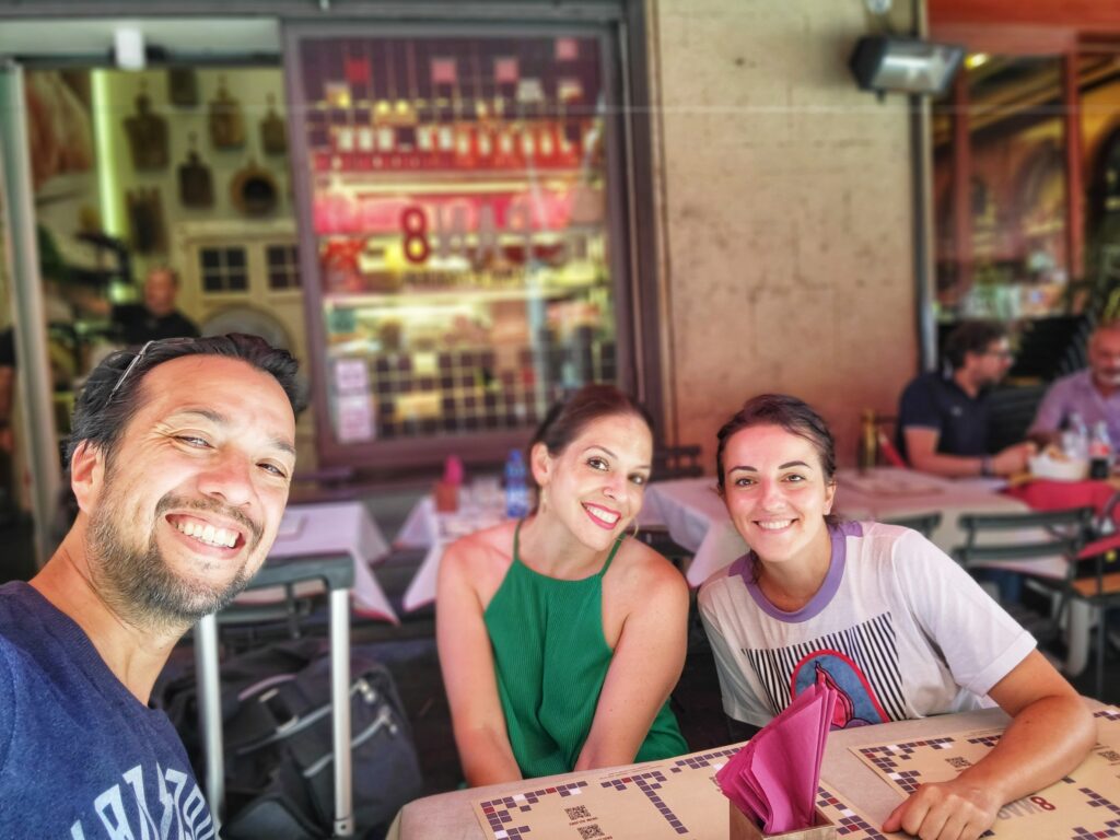 Marta, Linds, & James eating lunch in Bologna, Italy