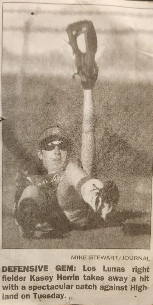 Kasey Herrin playing softball - newspaper cutout